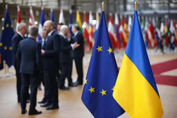 European Union and Ukraine flags displayed at an EU summit discussing enlargement policy