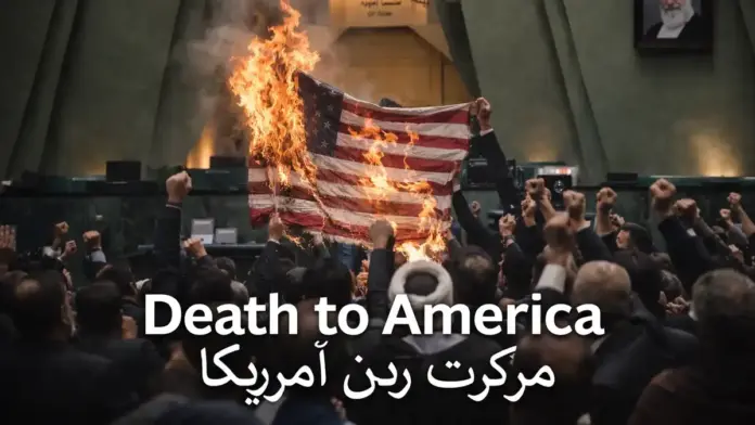 Θεσμική εικόνα για την προπαγάνδα στο Ιράν, με καύση αμερικανικής σημαίας και αντι-αμερικανικό συμβολισμό στη Βουλή