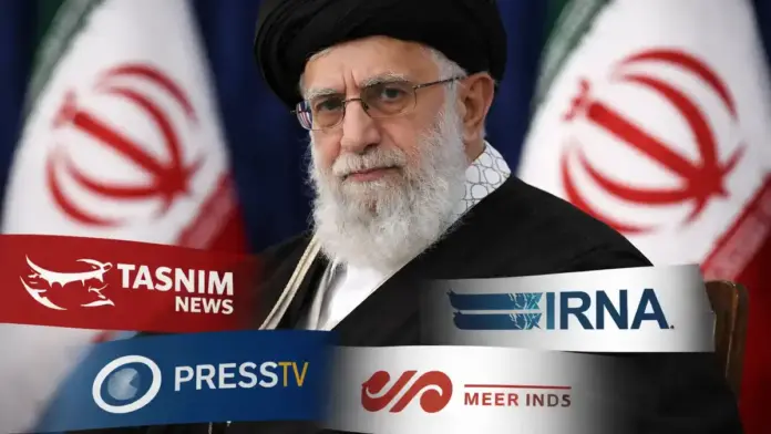 Θεσμική επιλεγμένη εικόνα για άρθρο σχετικά με τις δηλώσεις ιρανικών κρατικών/ευθυγραμμισμένων ΜΜΕ ότι ο Αλί Χαμενεΐ είναι ζωντανός: πορτρέτο ηγέτη με φόντο ιρανικές σημαίες, χωρίς κείμενο, ασφαλές για περικοπή 16:9.